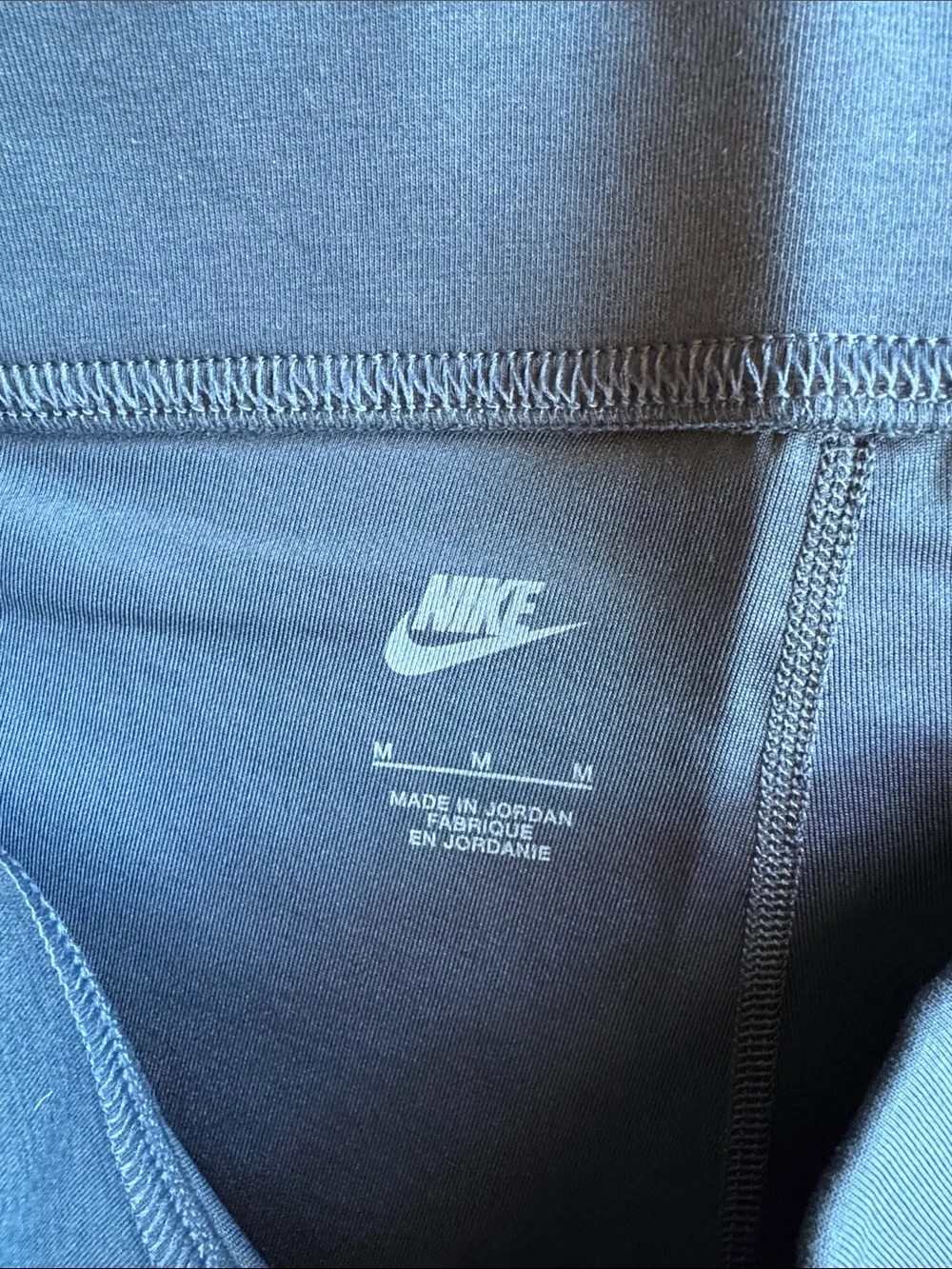 Nike women’s Marine Blue Bike Shorts with White Swoosh NWOT M